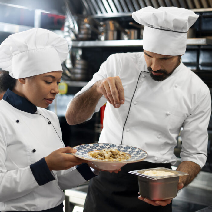 medium-shot-professional-chefs-working-together