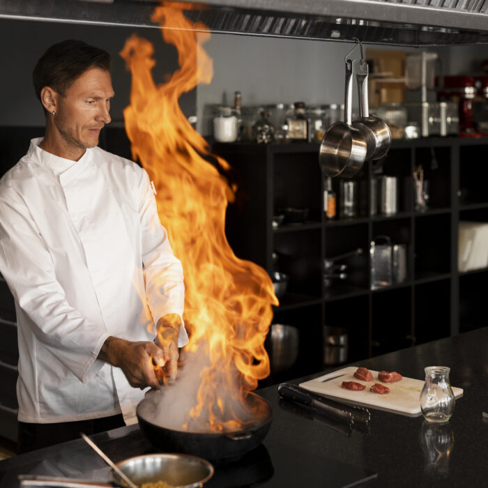 professional-chef-preparing-food-kitchen